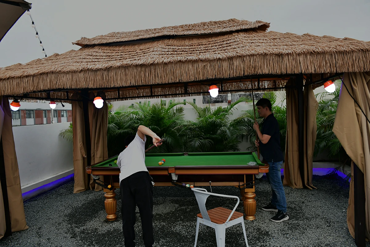 Outdoor restaurant terrace with YouLumi HA11 RGB Cage String Lights