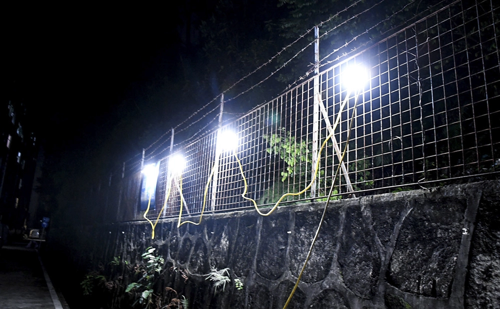 LED string lights installed on an outdoor wall, demonstrating the night effect"